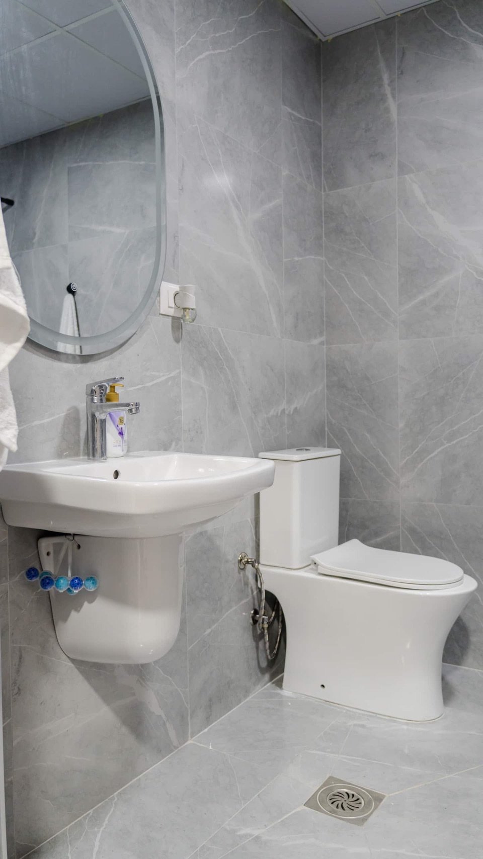 Amber apartment bathroom with a glass shower