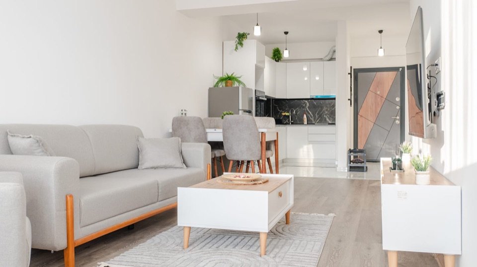 Pearl apartment open-plan living area and equipped kitchen